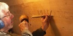 Richard carving the home Port on the transom